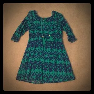 This is a girls sequin hearts size 8 dress